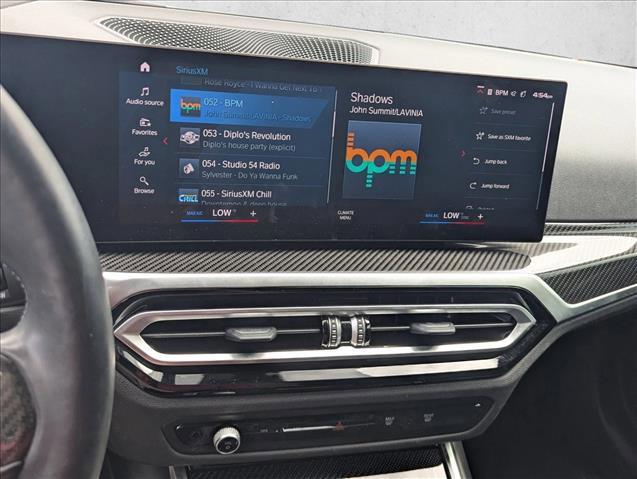 used 2024 BMW M4 car, priced at $77,489