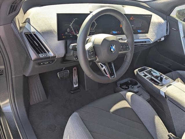 new 2026 BMW iX car, priced at $98,525