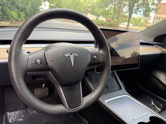 used 2023 Tesla Model 3 car, priced at $27,991