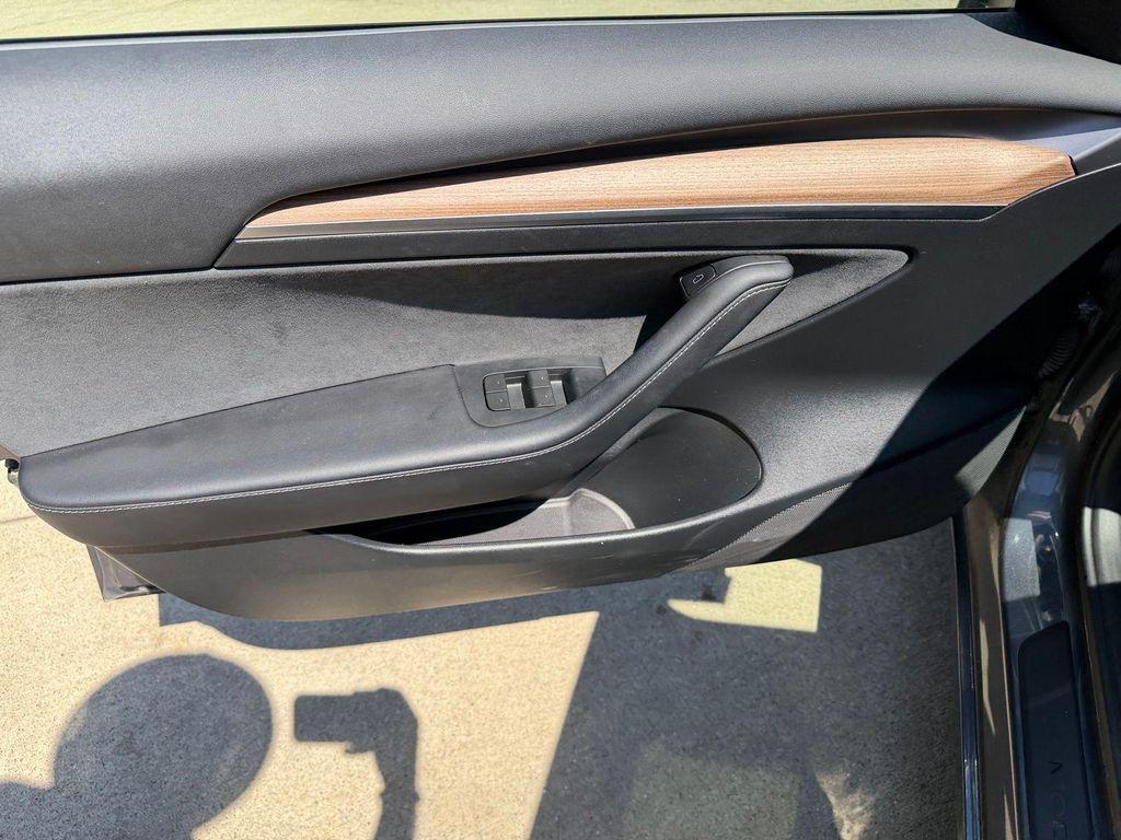 used 2023 Tesla Model 3 car, priced at $27,512