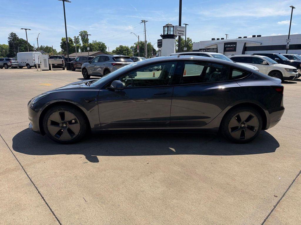 used 2023 Tesla Model 3 car, priced at $27,512