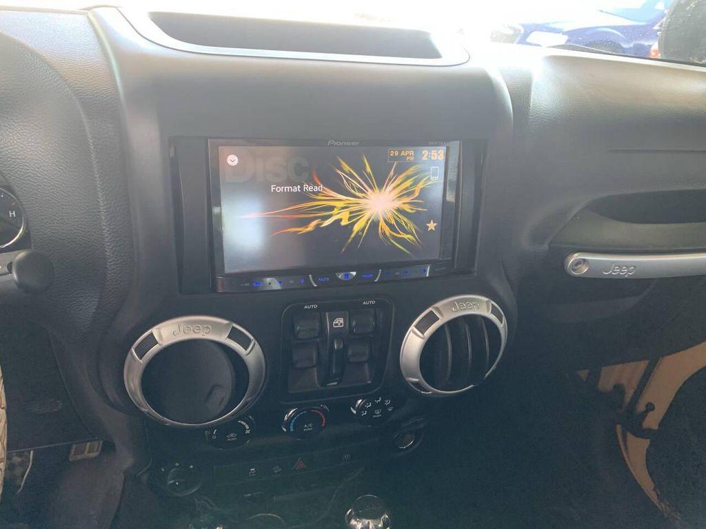 used 2013 Jeep Wrangler Unlimited car, priced at $15,950