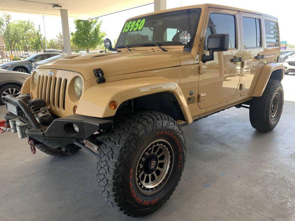 used 2013 Jeep Wrangler Unlimited car, priced at $15,950