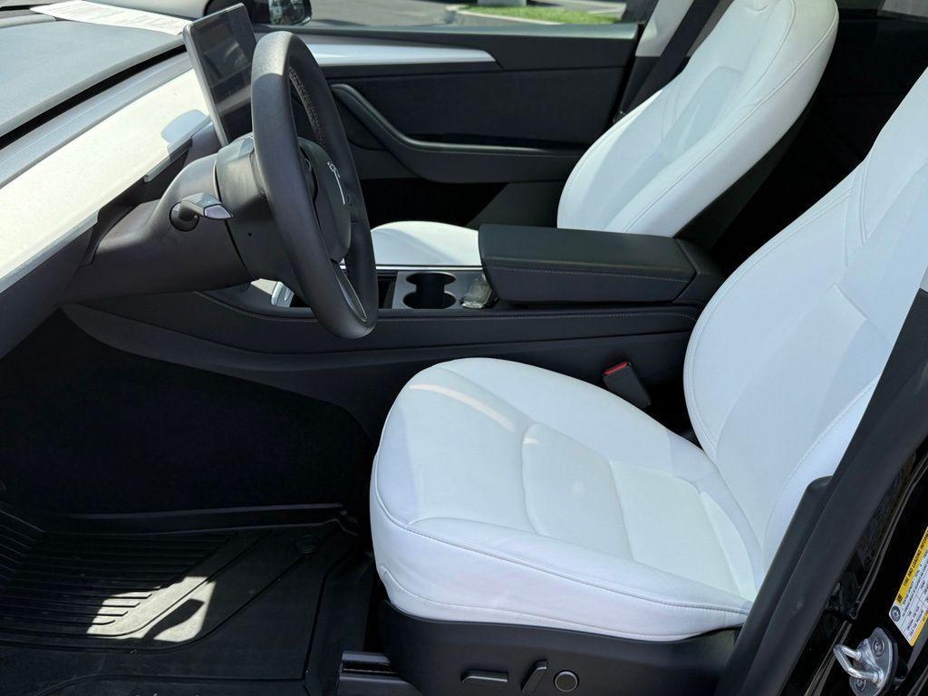 used 2024 Tesla Model Y car, priced at $31,585