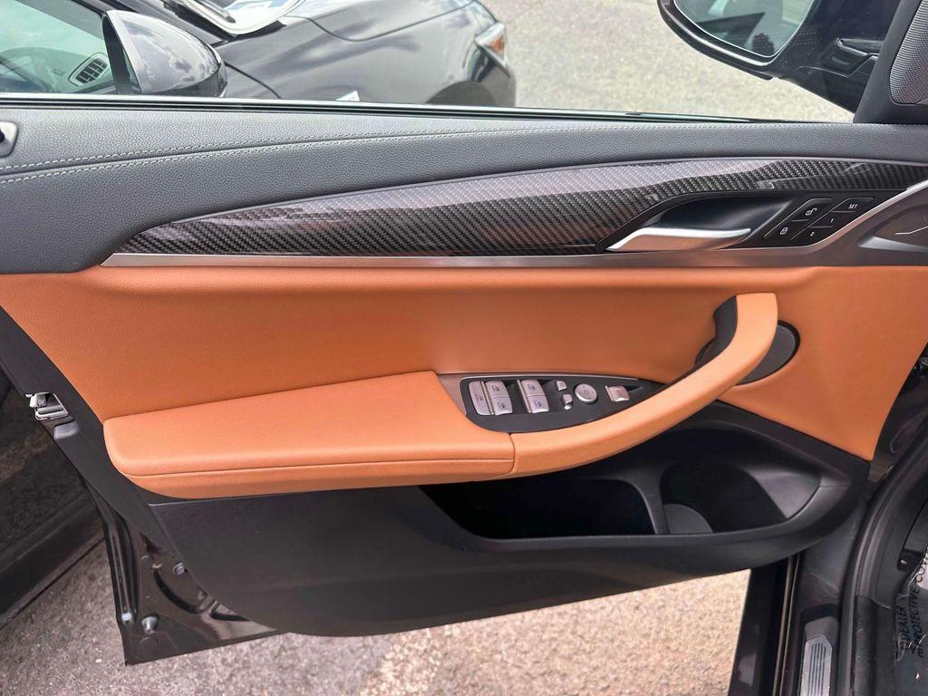 used 2023 BMW X4 car, priced at $42,898