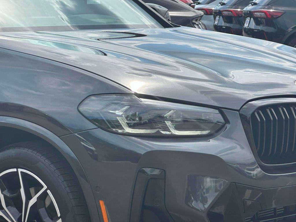 used 2023 BMW X4 car, priced at $42,898