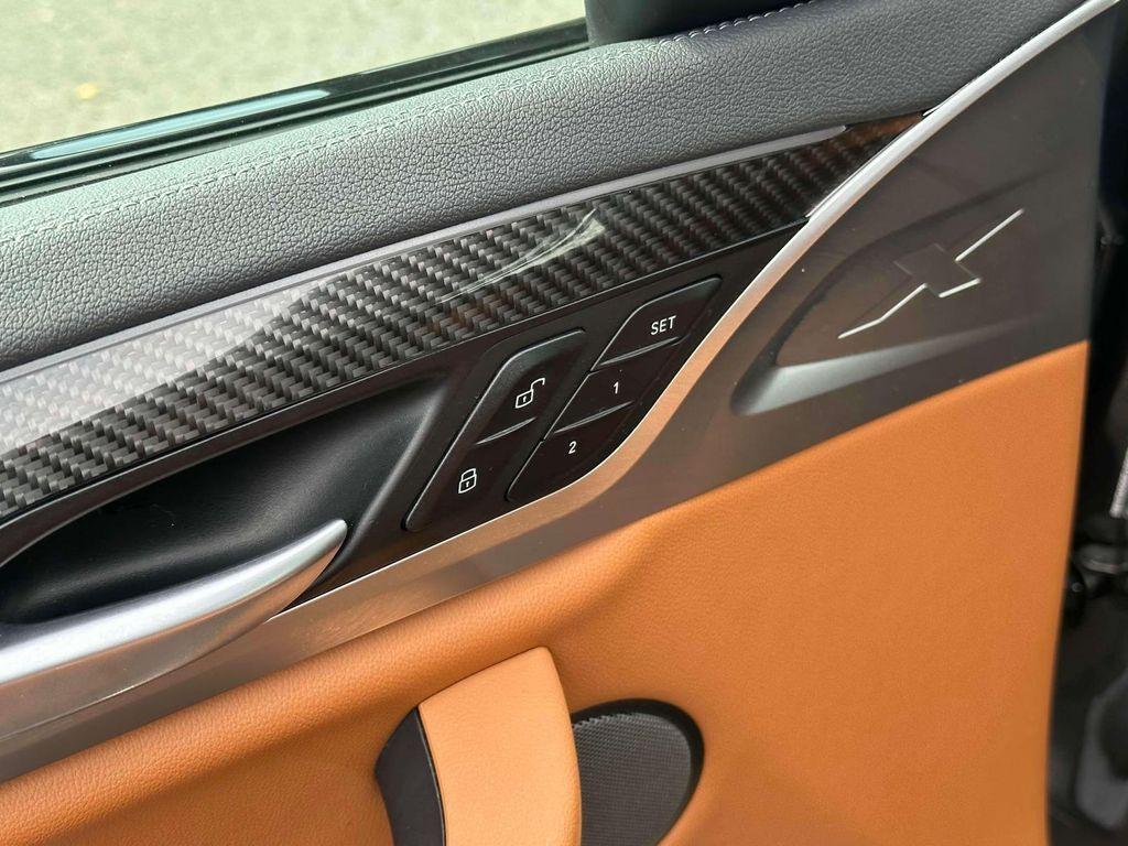 used 2023 BMW X4 car, priced at $42,898