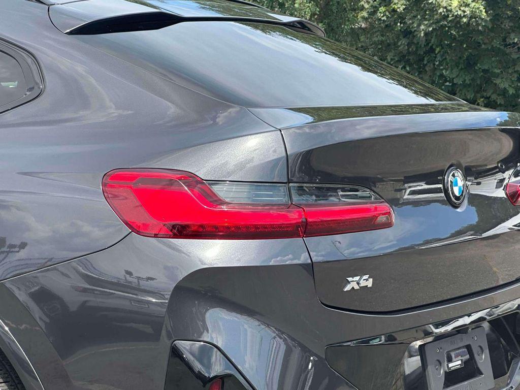 used 2023 BMW X4 car, priced at $42,898