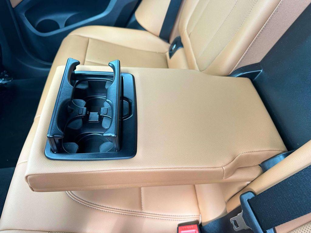 used 2023 BMW X4 car, priced at $42,898