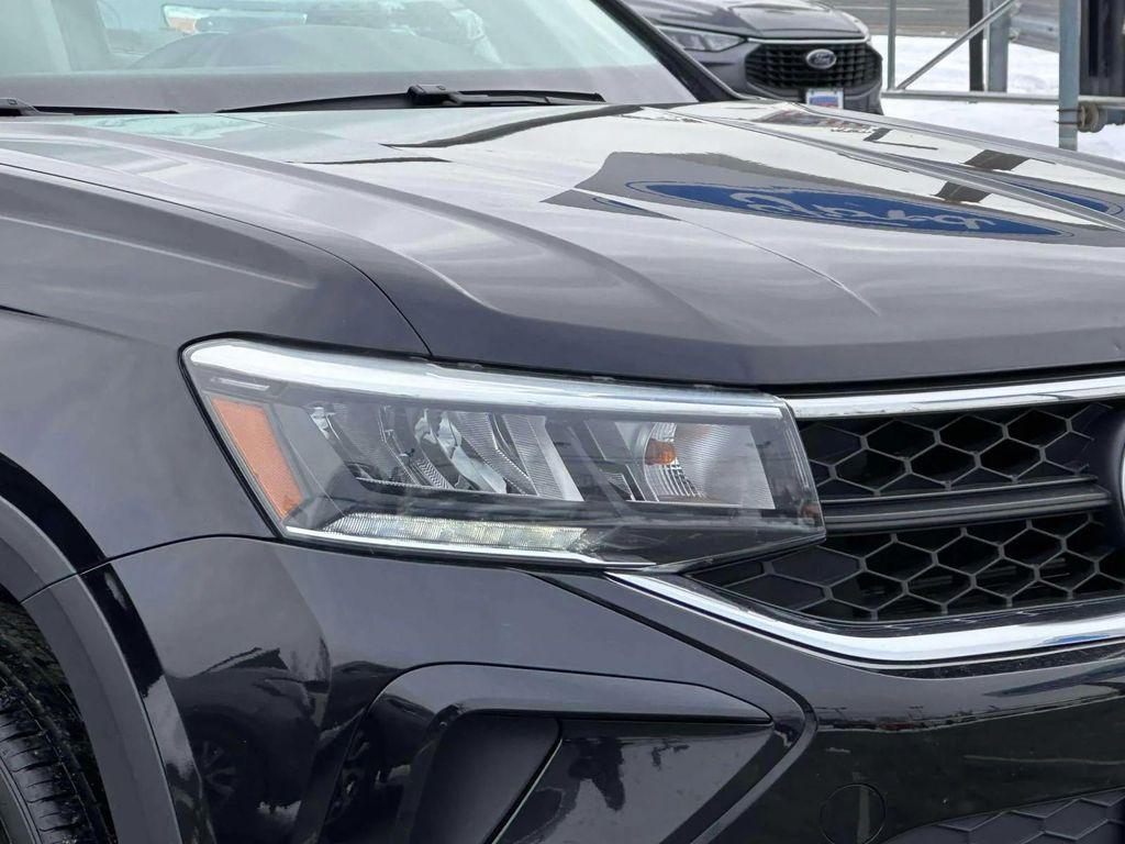 used 2024 Volkswagen Taos car, priced at $15,998