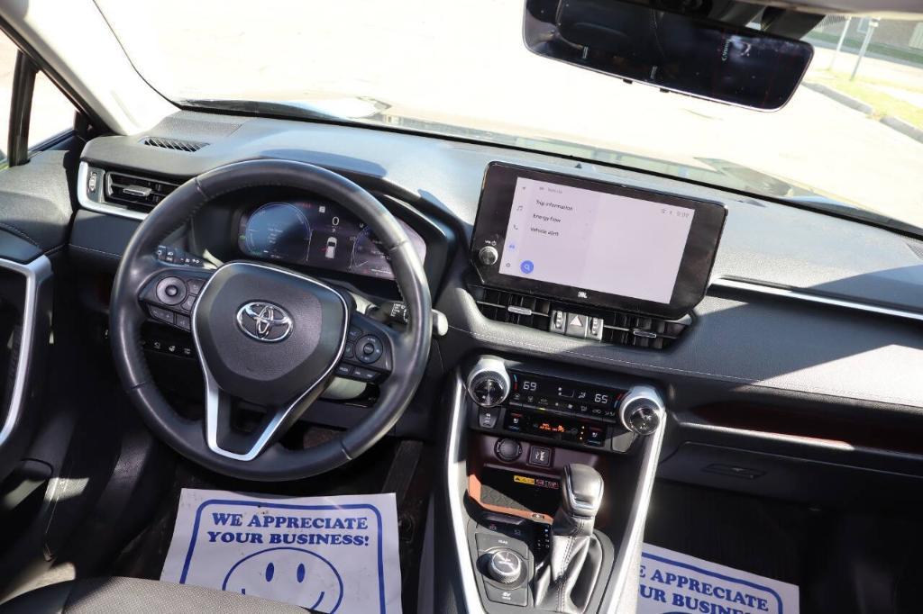 used 2024 Toyota RAV4 Hybrid car, priced at $32,500