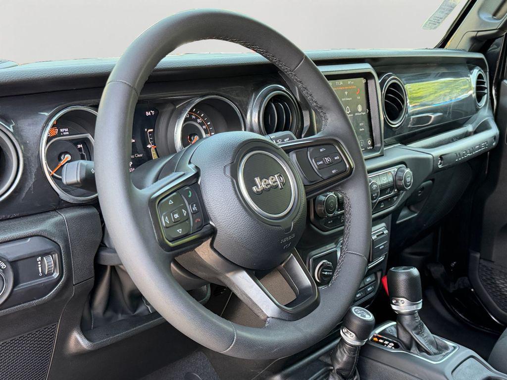 used 2023 Jeep Wrangler car, priced at $33,300