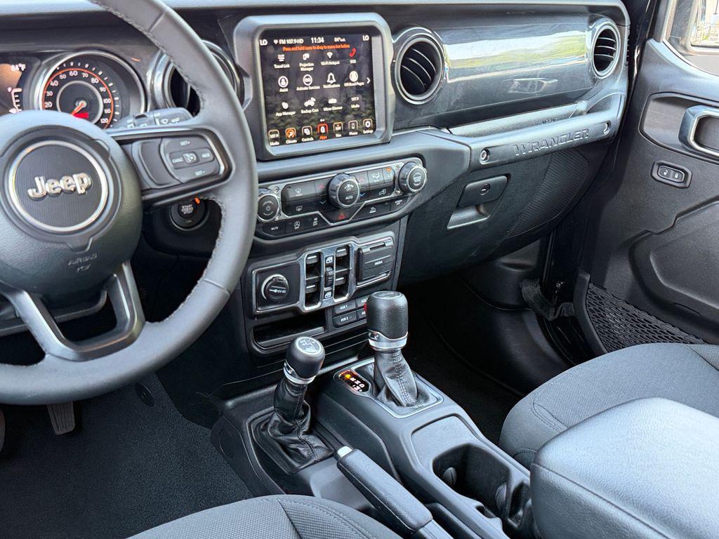 used 2023 Jeep Wrangler car, priced at $33,300