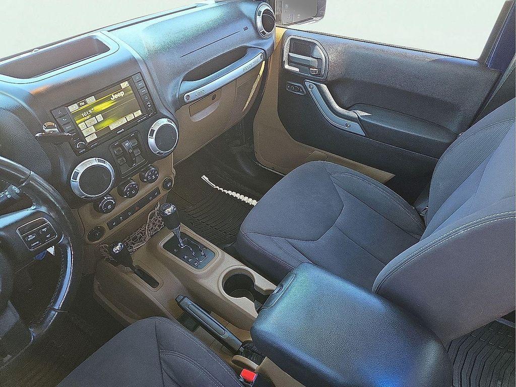 used 2013 Jeep Wrangler Unlimited car, priced at $13,179