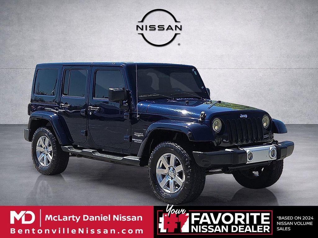 used 2013 Jeep Wrangler Unlimited car, priced at $13,179