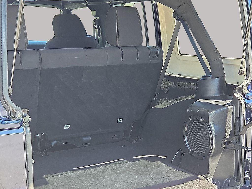 used 2013 Jeep Wrangler Unlimited car, priced at $13,179