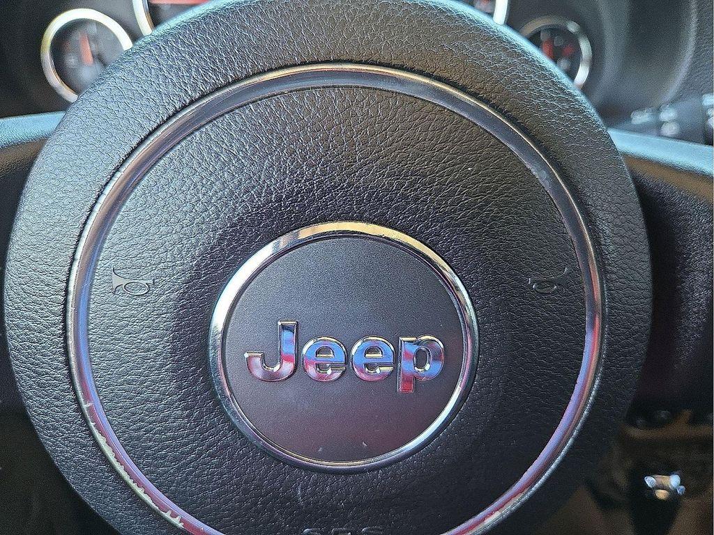 used 2013 Jeep Wrangler Unlimited car, priced at $13,179