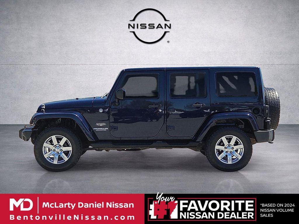 used 2013 Jeep Wrangler Unlimited car, priced at $13,179