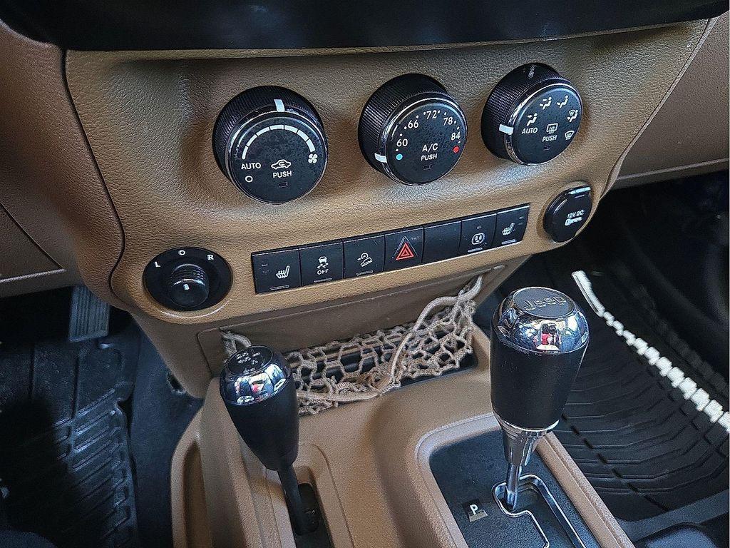 used 2013 Jeep Wrangler Unlimited car, priced at $13,179