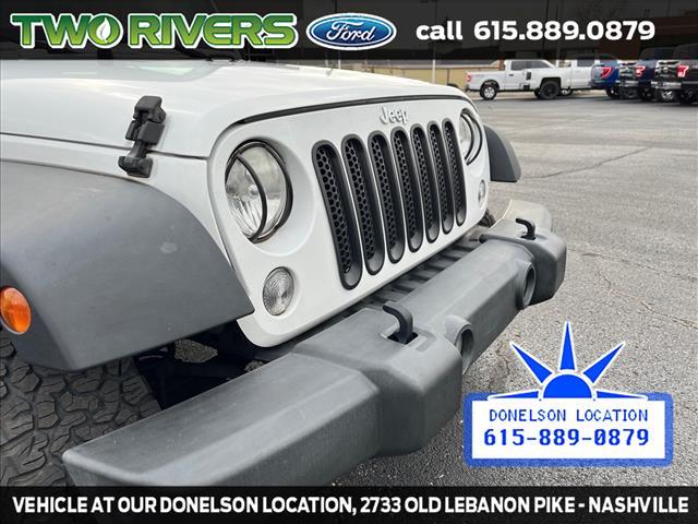 used 2014 Jeep Wrangler Unlimited car, priced at $13,388