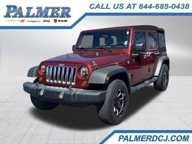 used 2010 Jeep Wrangler Unlimited car, priced at $12,991