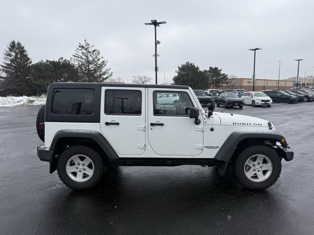 used 2012 Jeep Wrangler Unlimited car, priced at $18,699