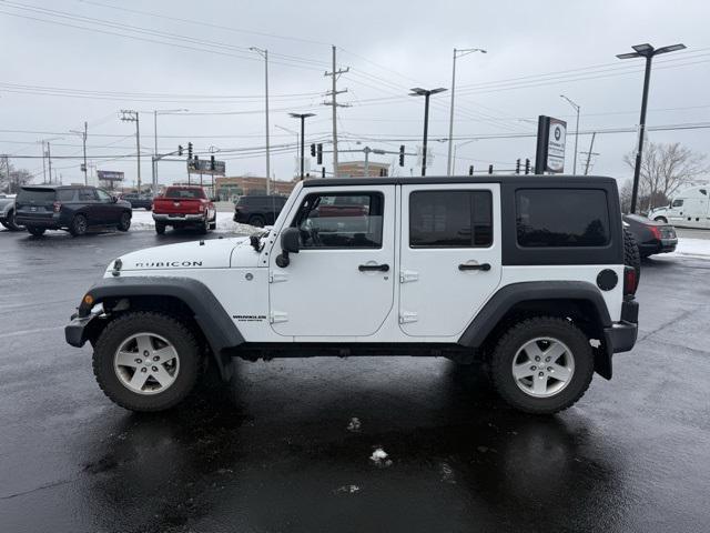 used 2012 Jeep Wrangler Unlimited car, priced at $18,699