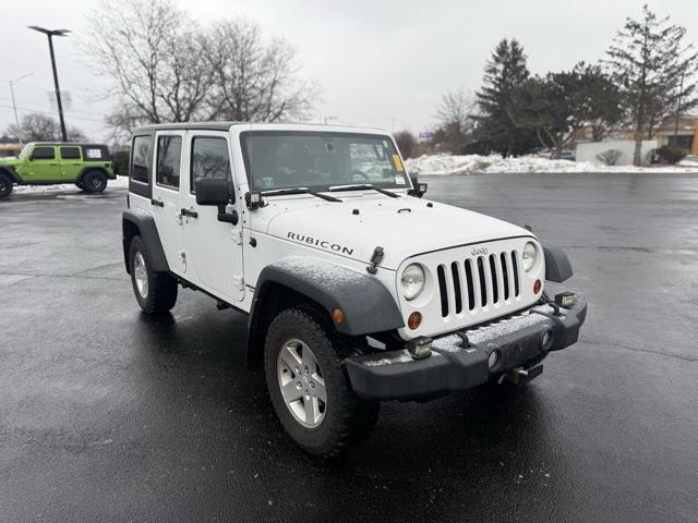 used 2012 Jeep Wrangler Unlimited car, priced at $18,699