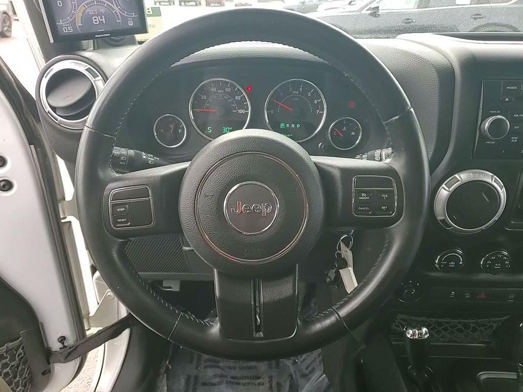 used 2012 Jeep Wrangler Unlimited car, priced at $17,189