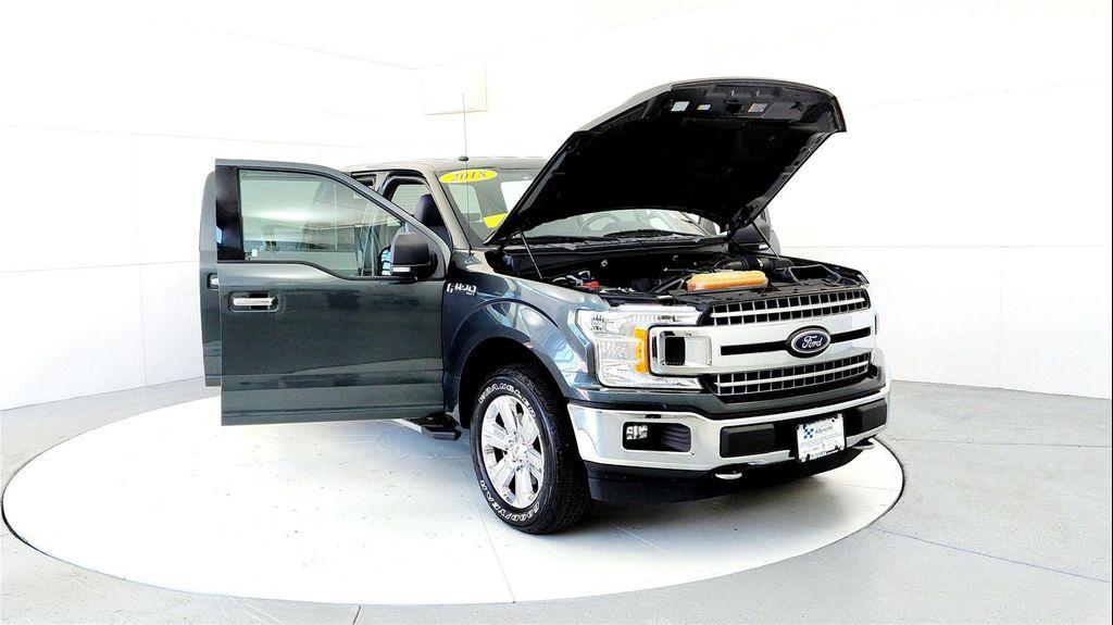 used 2018 Ford F-150 car, priced at $28,595
