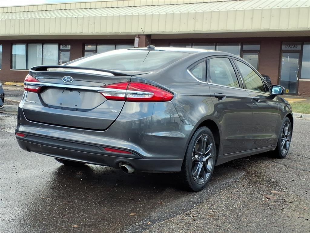 used 2018 Ford Fusion car, priced at $9,998