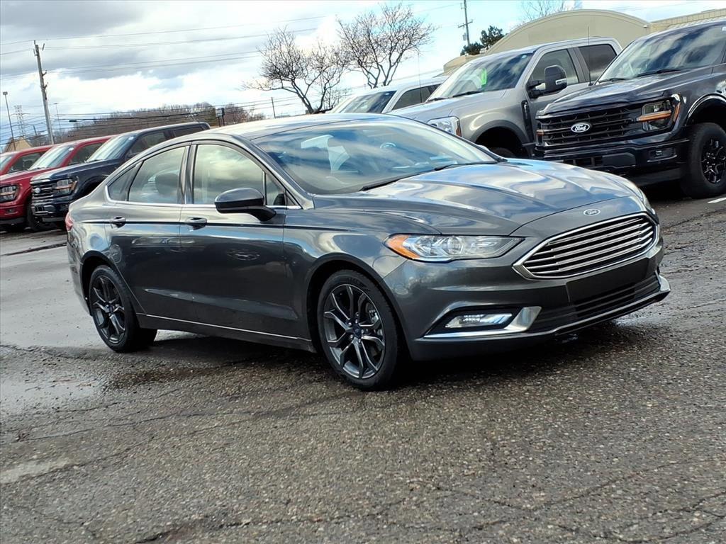 used 2018 Ford Fusion car, priced at $9,998