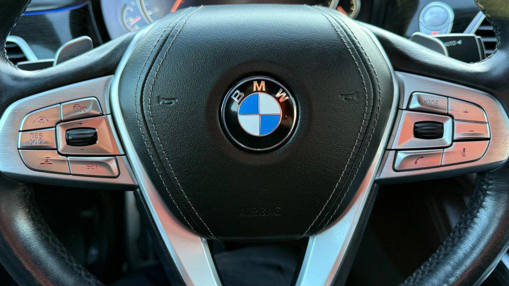 used 2016 BMW 750 car, priced at $17,950