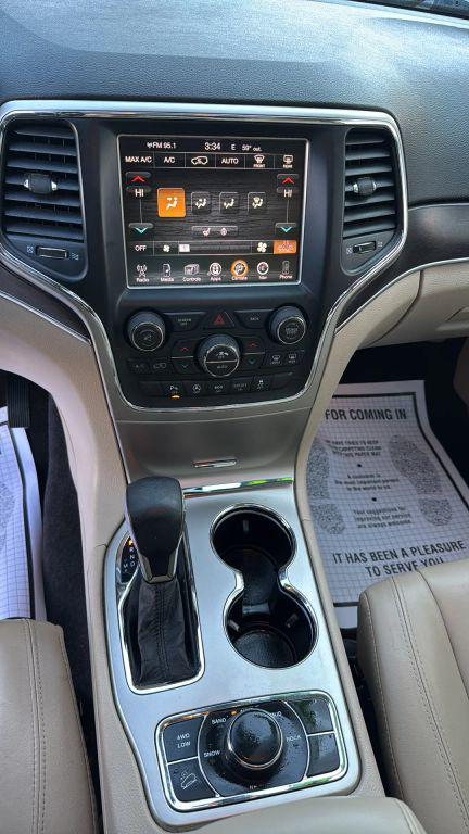 used 2016 Jeep Grand Cherokee car, priced at $13,995