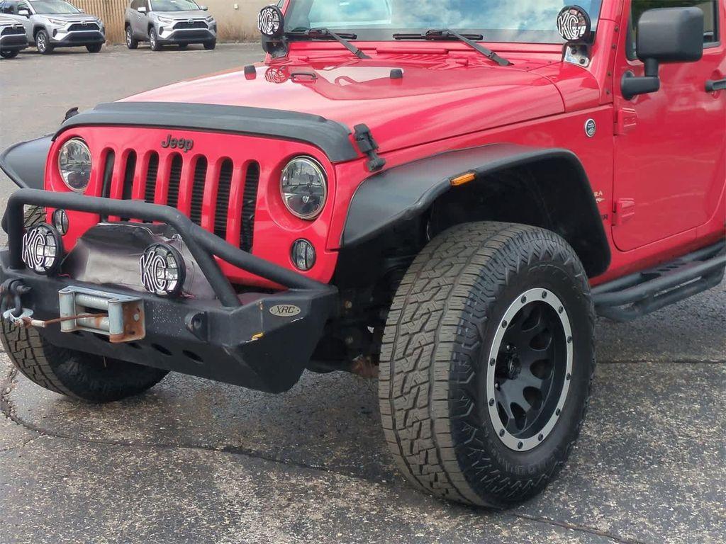 used 2014 Jeep Wrangler car, priced at $14,000