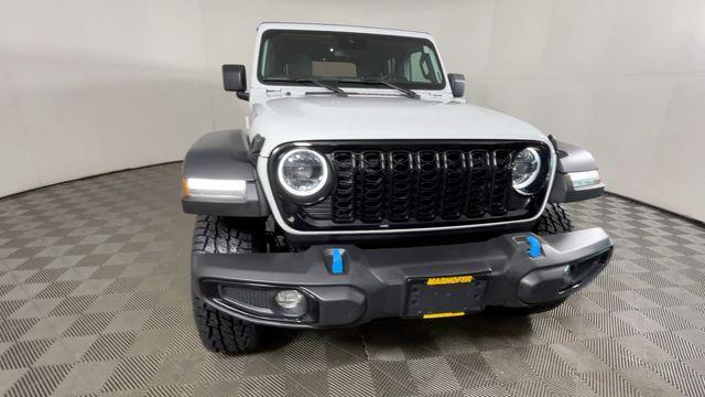 used 2024 Jeep Wrangler 4xe car, priced at $27,948