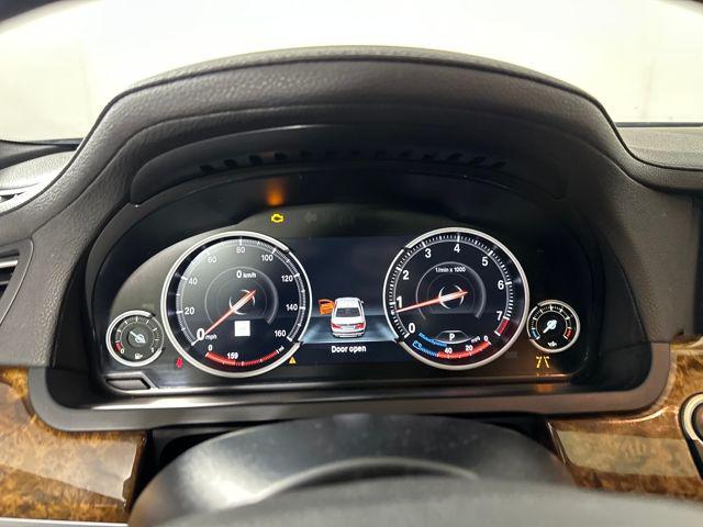 used 2014 BMW 750 car, priced at $13,500