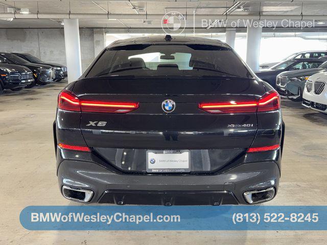 used 2025 BMW X6 car, priced at $67,240
