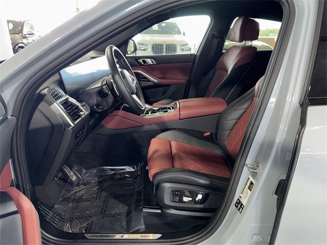 used 2025 BMW X6 car, priced at $70,445