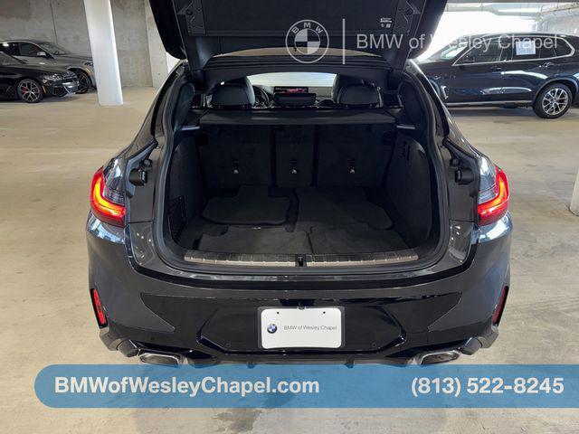 used 2025 BMW X4 car, priced at $48,346