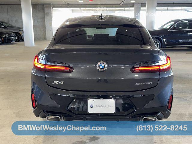 used 2025 BMW X4 car, priced at $48,346