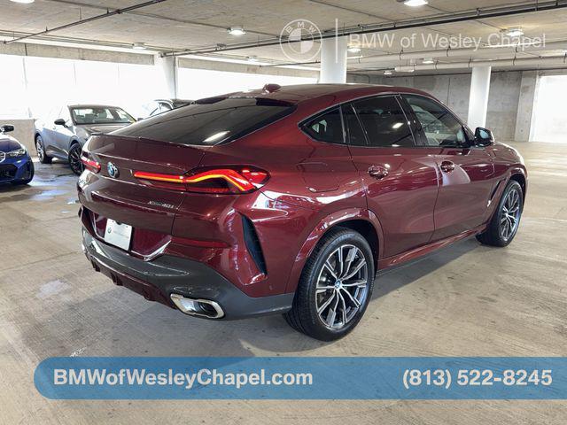 used 2025 BMW X6 car, priced at $66,931
