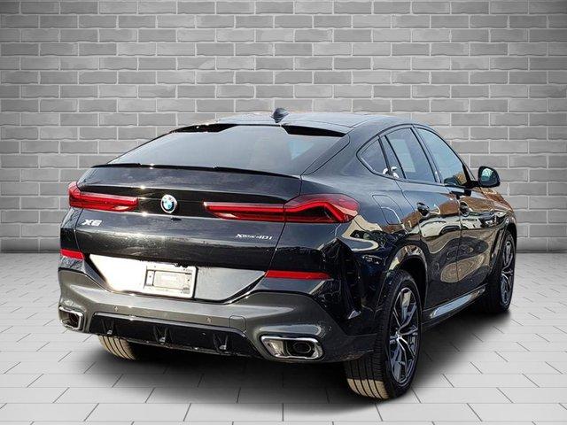 used 2023 BMW X6 car, priced at $56,987