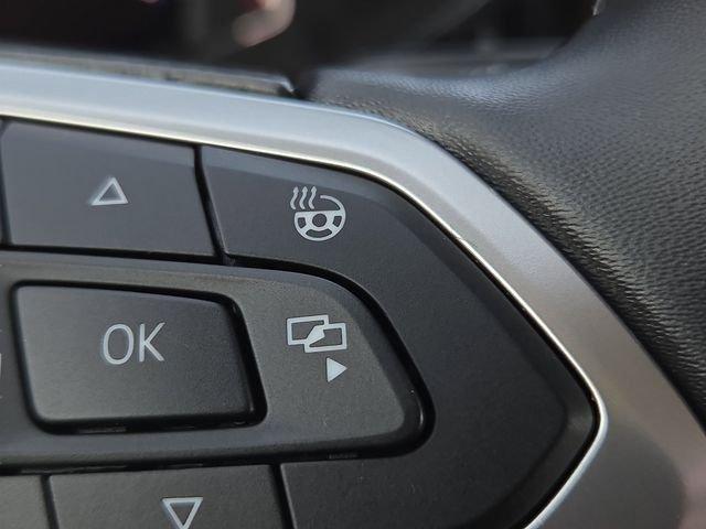 used 2023 Volkswagen Taos car, priced at $25,593
