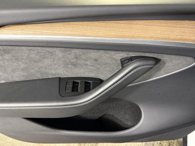 used 2024 Tesla Model Y car, priced at $34,995