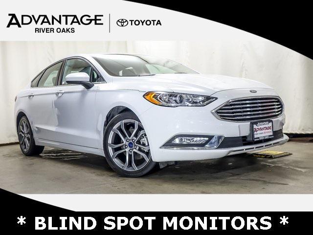 used 2017 Ford Fusion car, priced at $11,687