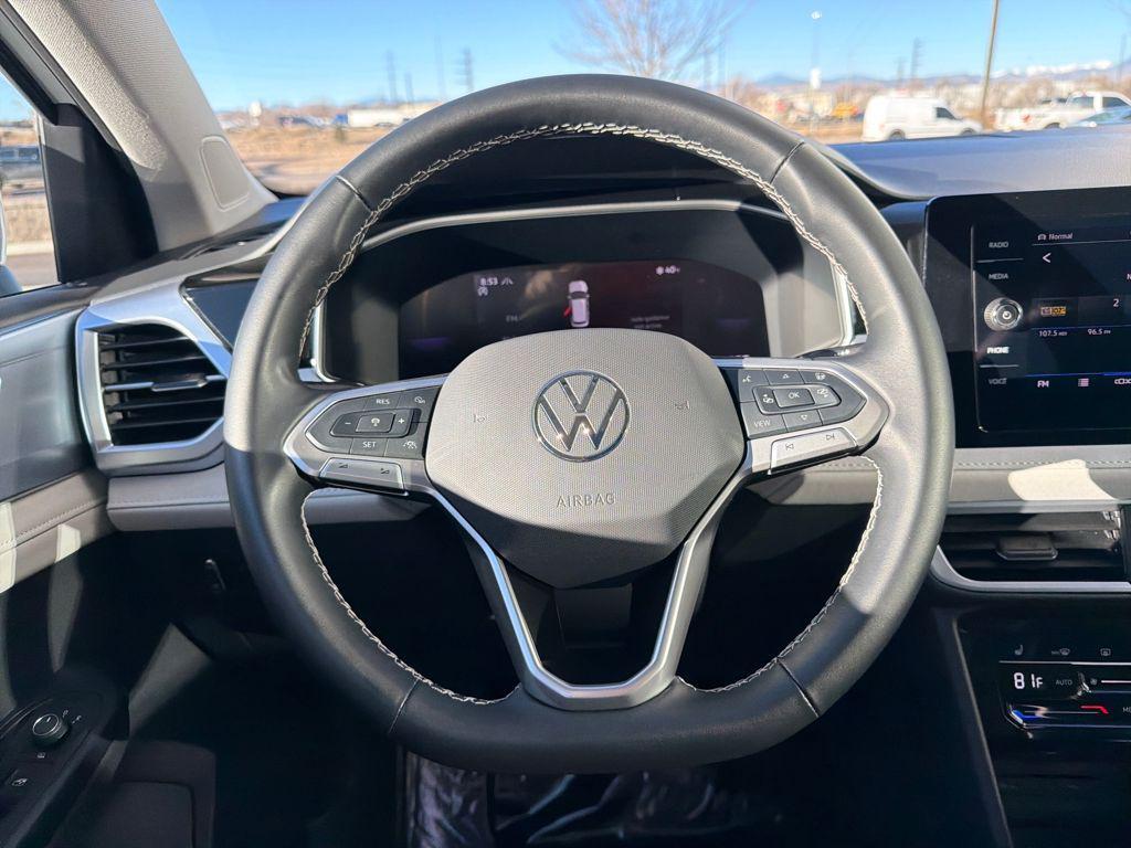 used 2025 Volkswagen Taos car, priced at $25,484