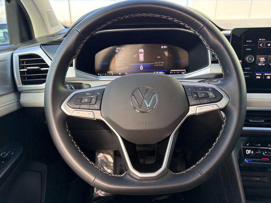 used 2025 Volkswagen Taos car, priced at $24,850