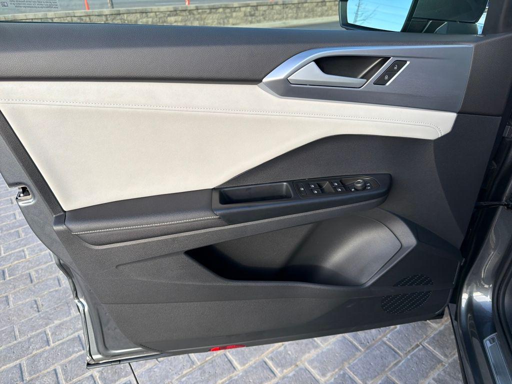 used 2025 Volkswagen Taos car, priced at $24,850