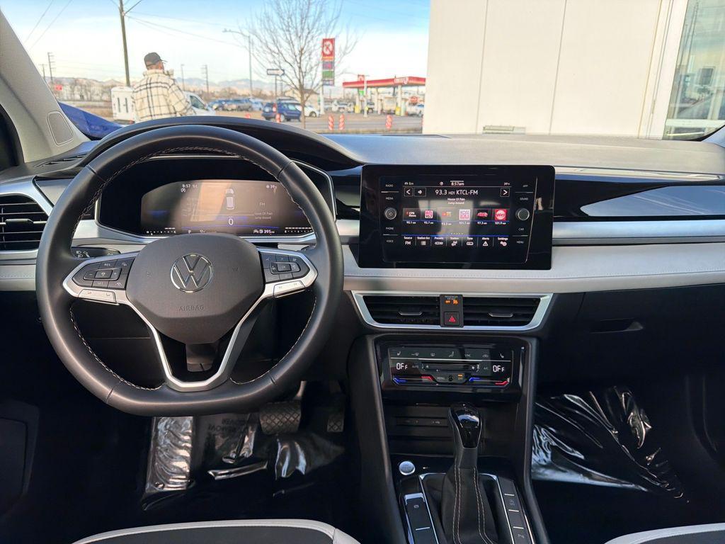 used 2025 Volkswagen Taos car, priced at $24,850